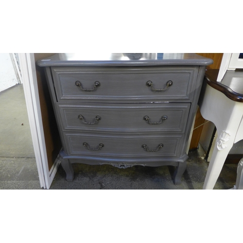 1575 - A grey three drawer chest and a white cheval mirror - marked