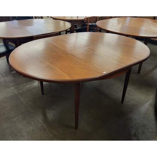 36 - A G-Plan Fresco teak circular extending dining table