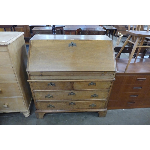 117 - A George II walnut bureau