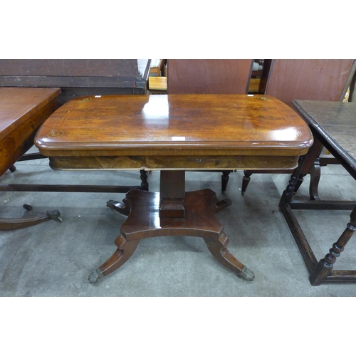 156 - A Victorian figured walnut and Tunbridgeware inlaid fold over games table, on associated base