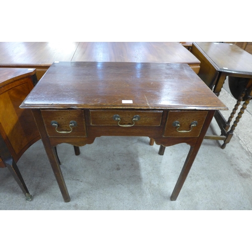 198 - A George III oak lowboy