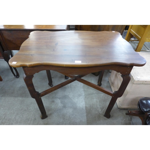 243 - A French fruitwood centre table