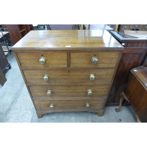 119 - A George III oak and elm chest of drawers