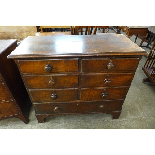 131 - A George III oak chest of drawers