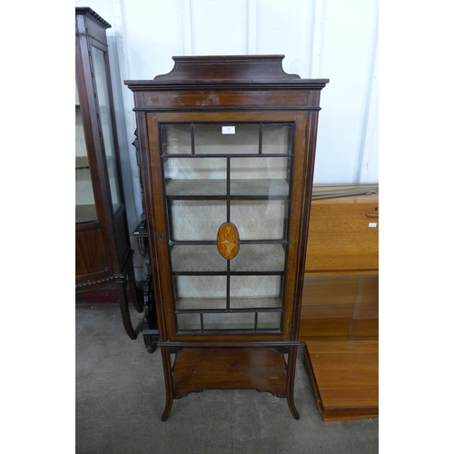 136 - An Edward VII inlaid mahogany display cabinet