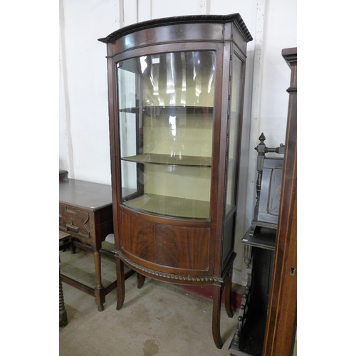 137 - An Edward VII mahogany bow front display cabinet