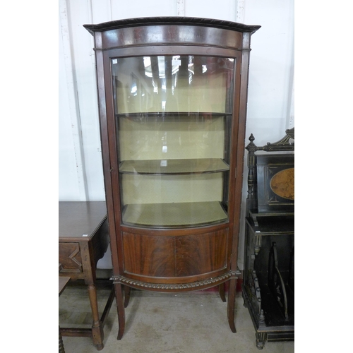 137 - An Edward VII mahogany bow front display cabinet