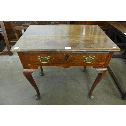 140 - A George III oak lowboy