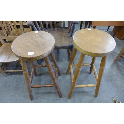 166 - A pair of beech bar stools