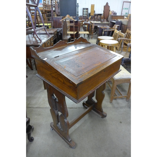 171 - An Arts and Crafts oak Davenport top desk