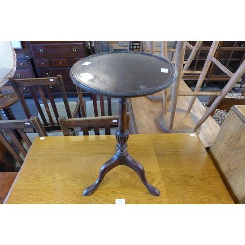 189 - A mahogany tripod wine table