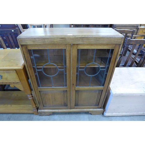 191 - An oak two door bookcase