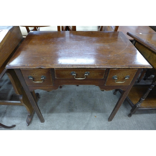 198 - A George III oak lowboy