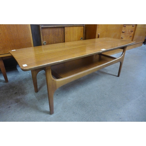 20 - A Jentique teak coffee table