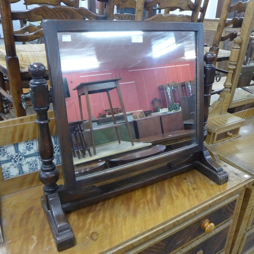 207 - An oak dressing table mirror