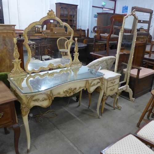 212 - A French cream and parcel gilt dressing table, cheval mirror and table de nuit