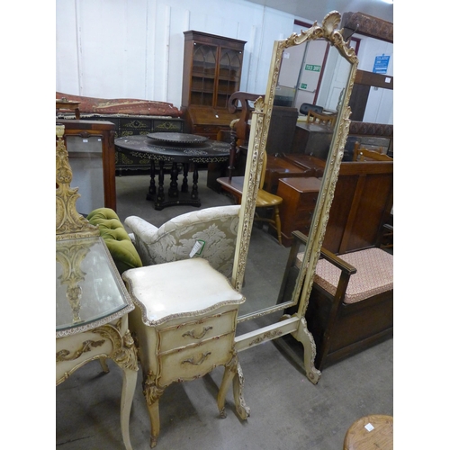 212 - A French cream and parcel gilt dressing table, cheval mirror and table de nuit