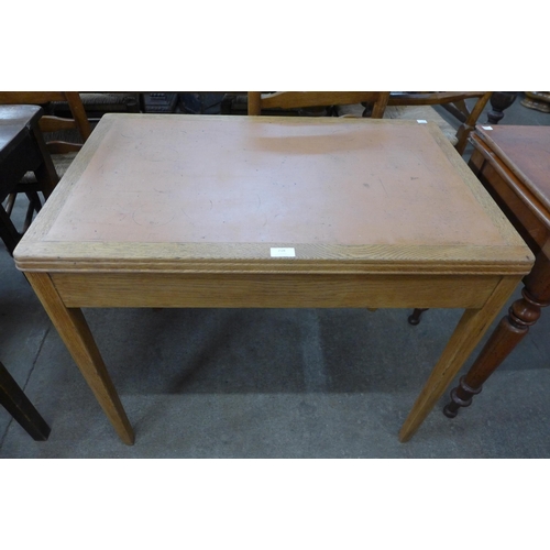 218 - An Air Ministry issue oak writing table