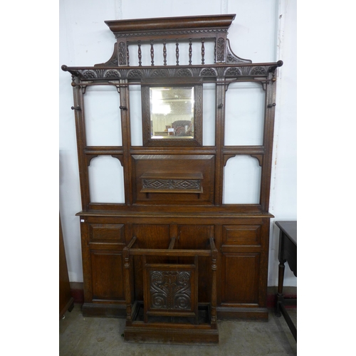 220 - A Victorian Jacobean Revival carved oak hallstand