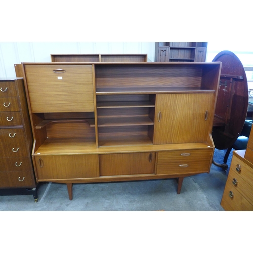 23 - An Elliotts of Newbury teak highboard