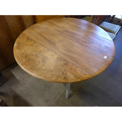 238 - A painted Ercol elm kitchen table