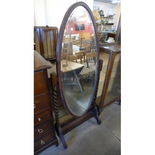 246 - An early 20th Century oak barleytwist cheval mirror