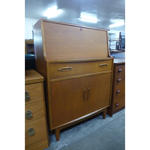 25 - A Jentique teak bureau