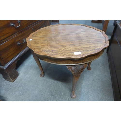 266B - A circular walnut coffee table