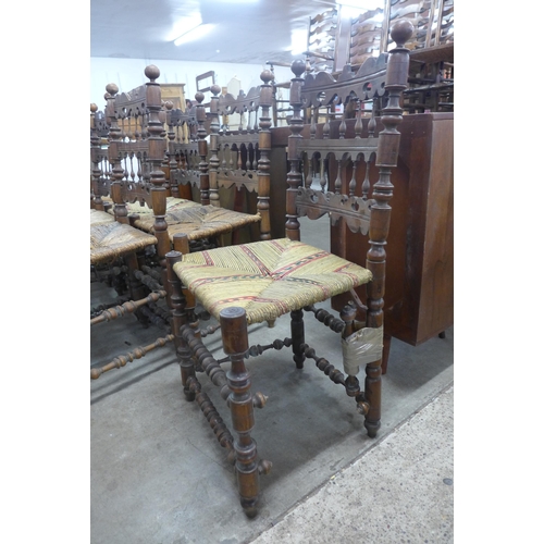 266D - A set of eight early 20th Century French beech and rush seated chairs, a/f