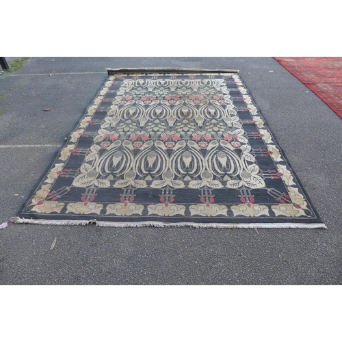 266E - An eastern red ground rug, 377 x 275cms and one other, 347 x 237cms