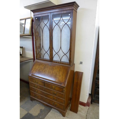 272 - A George III style mahogany bureau bookcase