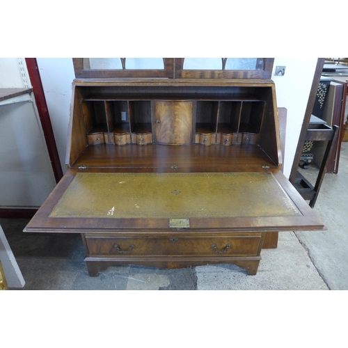 272 - A George III style mahogany bureau bookcase