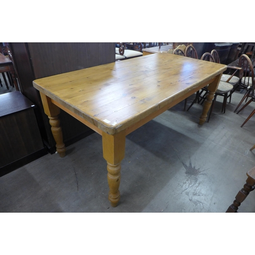 281 - A pine farmhouse kitchen table