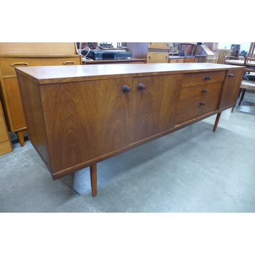 34 - A teak sideboard