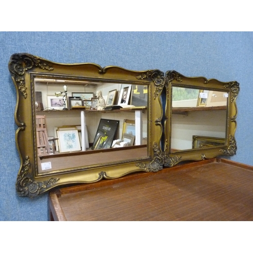 387 - A pair of small gilt framed mirrors