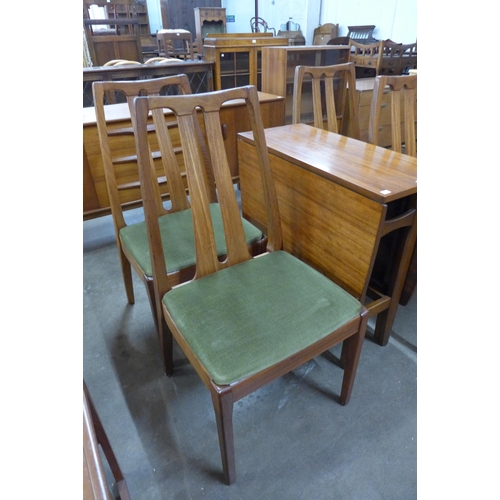 53 - A Nathan teak drop-leaf table and four chairs