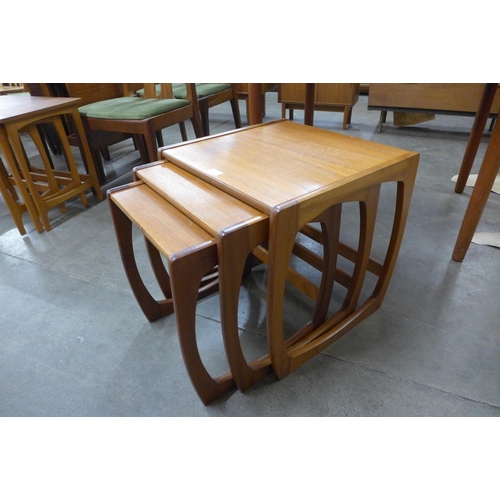 57 - A teak nest of tables