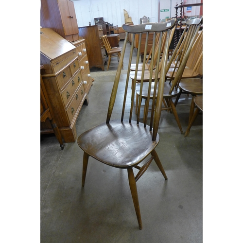 79 - A set of four Ercol Golden Dawn elm and beech Goldsmith chairs