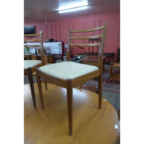 81 - A G-Plan Fresco teak extending dining table and six chairs