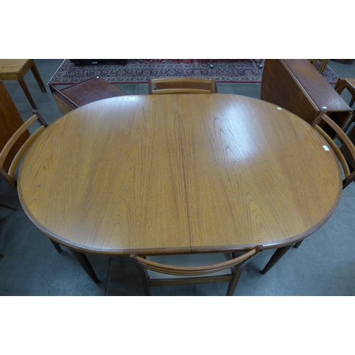 81 - A G-Plan Fresco teak extending dining table and six chairs