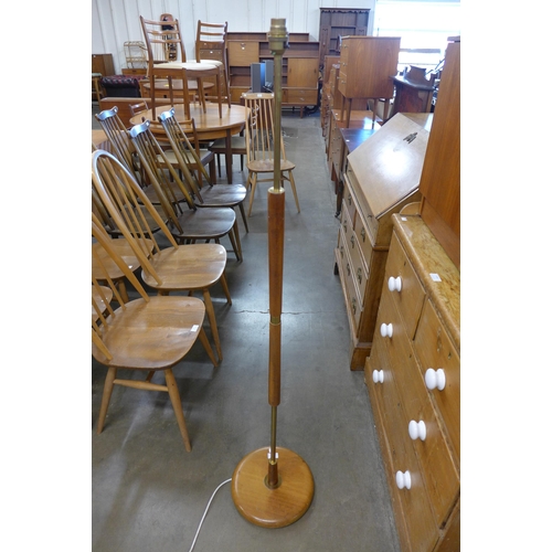 83 - A teak standard lamp