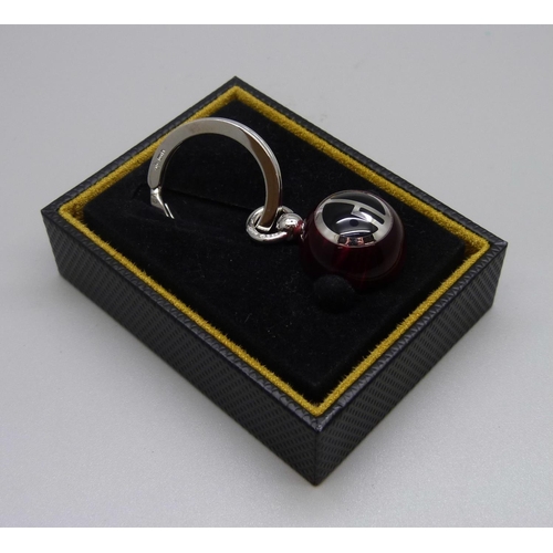 1013 - A Dunhill silver key ring, boxed