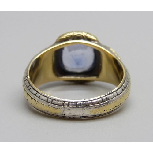 1019 - A yellow and white metal ring set with a topaz stone, 11g, V