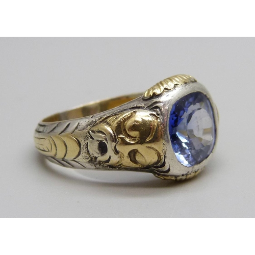 1019 - A yellow and white metal ring set with a topaz stone, 11g, V