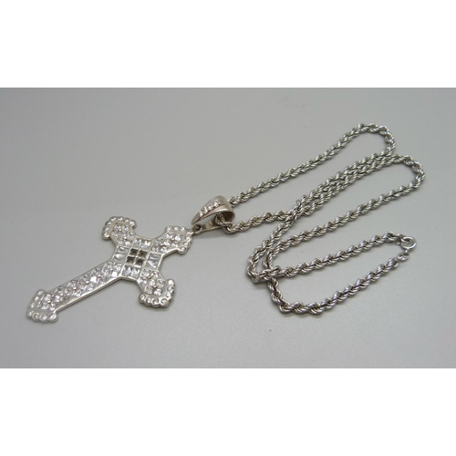 1020 - A silver and cubic zirconia cross pendant and chain, 44g