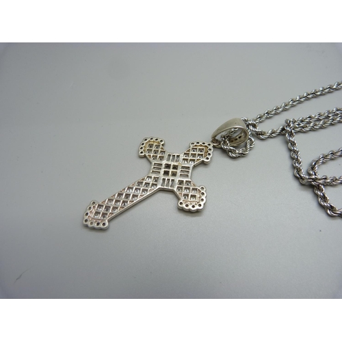 1020 - A silver and cubic zirconia cross pendant and chain, 44g