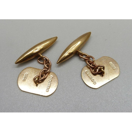 1021 - A pair of 9ct gold cufflinks, 4.6g