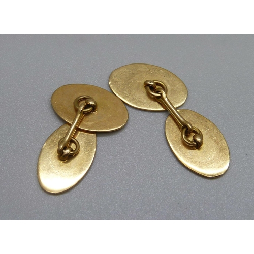 1036 - A pair of 18ct gold cufflinks, 9.5g