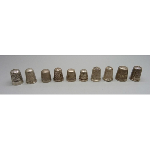 1042 - Ten silver thimbles