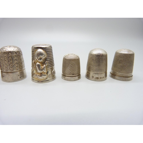 1043 - Ten silver thimbles